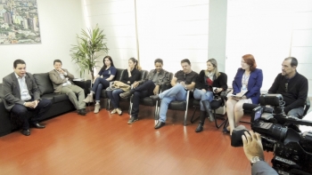 O presidente com os profissionais de imprensa|